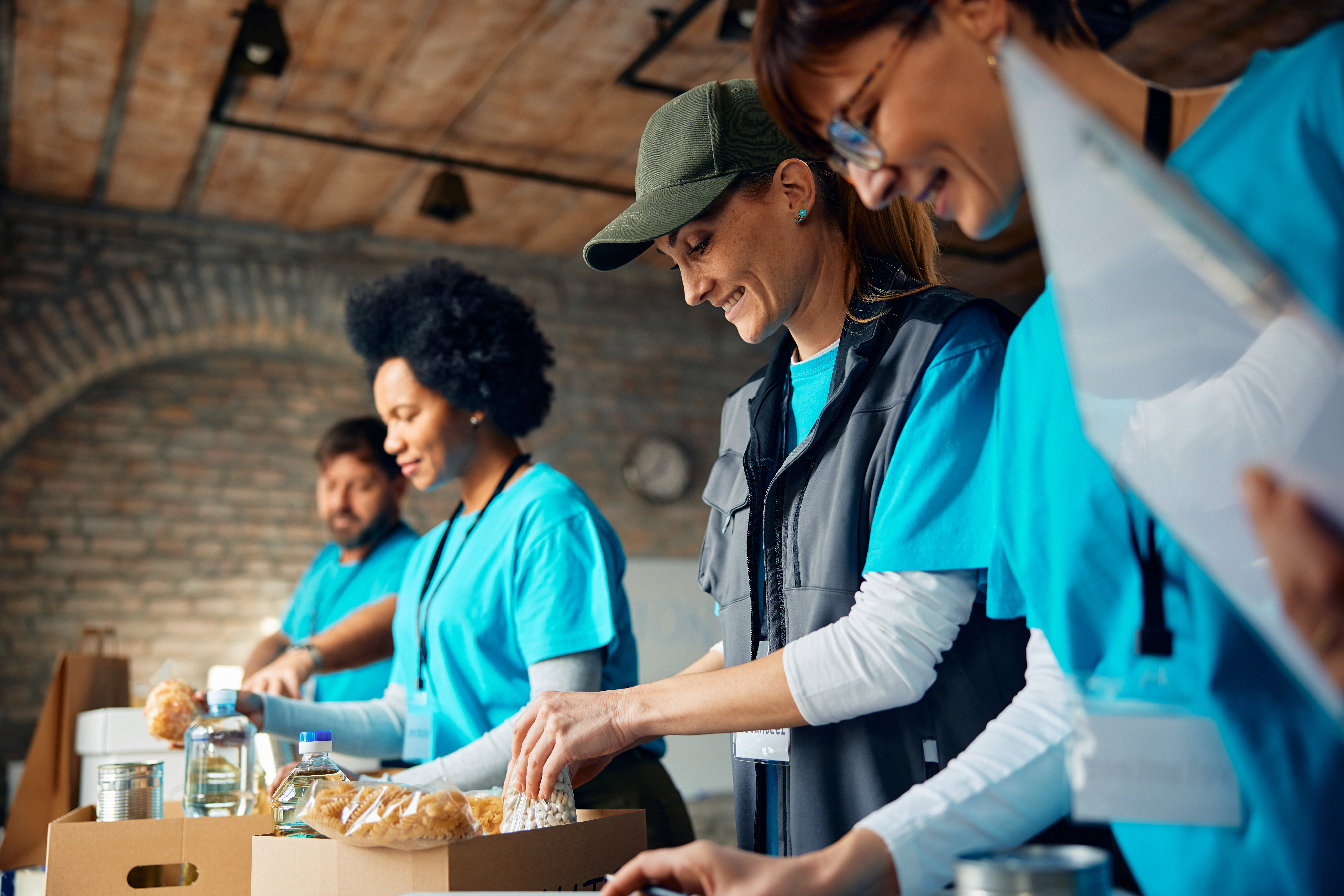 Volunteers packing food